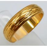 An 18K Yellow Gold Band Ring. Full UK hallmarks. Size L/M. 4.1g weight.
