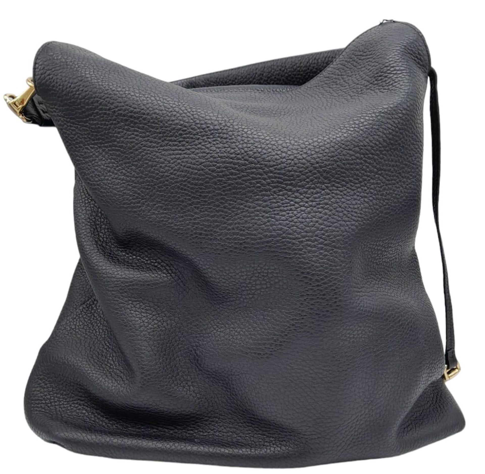 A Burberry Black Cale Hobo Bag. A leather exterior with a looping shoulder strap, gold tone hardware - Image 6 of 23