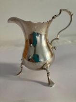 Stunning vintage SILVER CREAMER JUG Having fluted serpentine top with scroll handle and standing