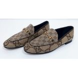 Gucci Women's MAXI Jordaan Loafers. GG monogram patterning, quality leather and gold tone