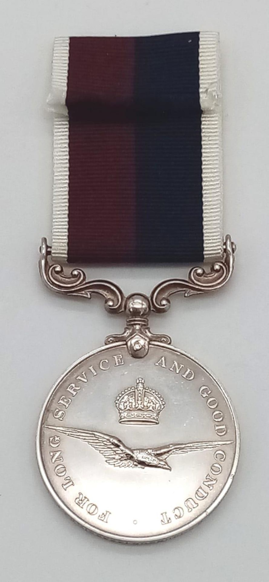 Royal Air Force Long Service and Good Conduct medal GVIR 1st type named to: W/O R G Johnson (355661)
