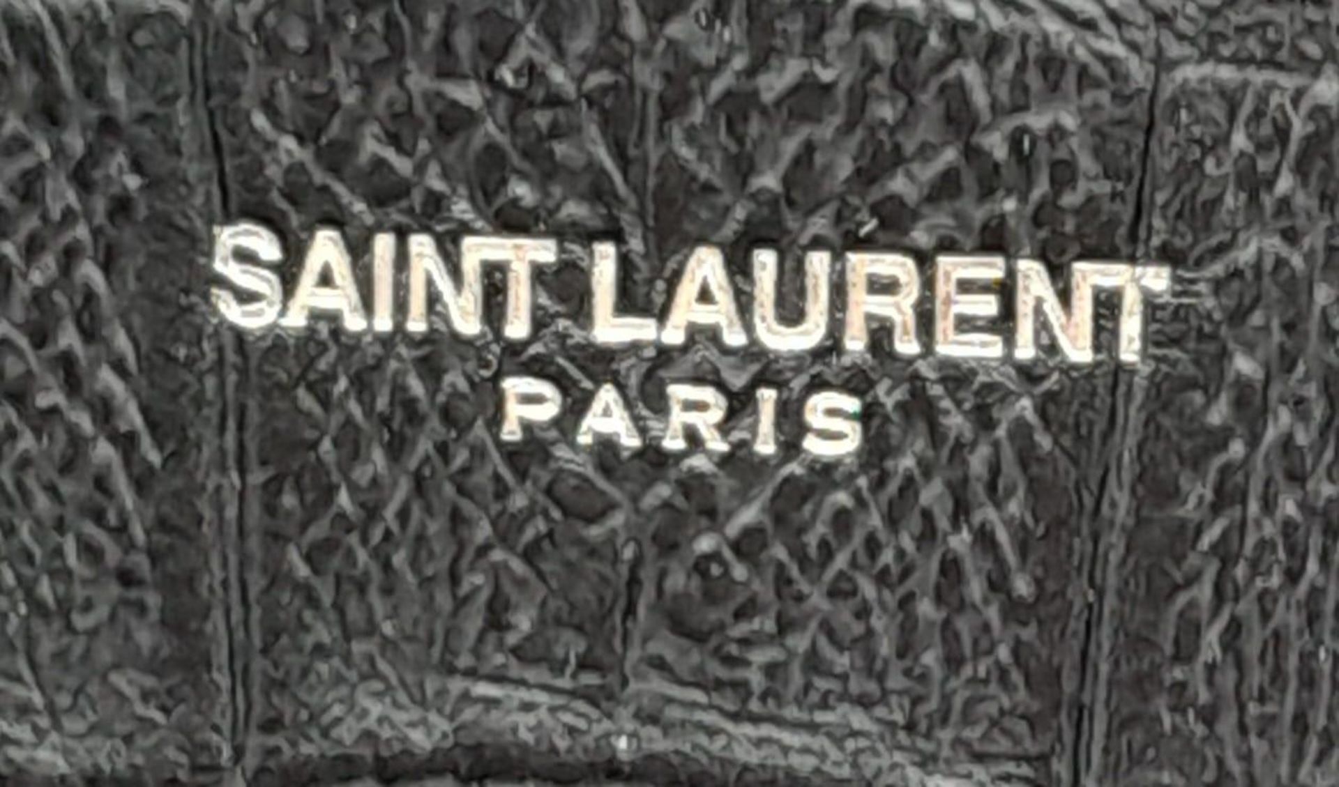 A Saint Laurent Sac de Jour Handbag. Crocodile embossed leather exterior with silver hardware and - Image 20 of 21