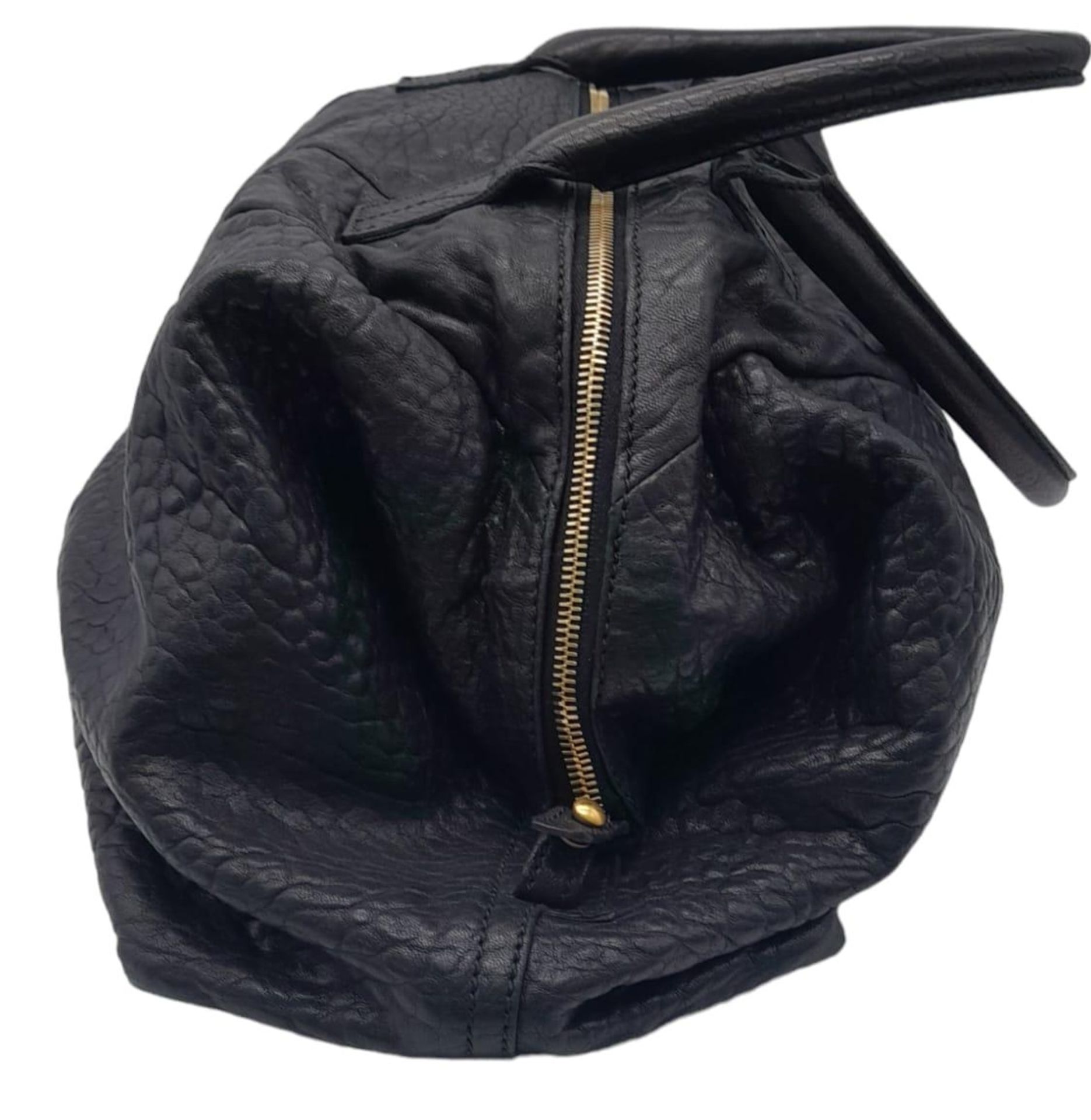 An Yves Saint Laurent Black Easy Bag. Leather exterior with gold hardware, double zipper, and 5 - Image 2 of 19