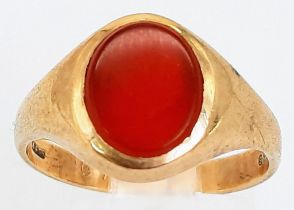 A Vintage 9K Yellow Gold Carnelian Signet Ring. Oval cabochon. Size O. 3.47g total weight.