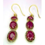 A Pair of Ruby and Diamond Dangler Earrings set in Gilded 925 Silver. Ruby - 10ctw. 4cm drop. 8.