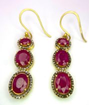 A Pair of Ruby and Diamond Dangler Earrings set in Gilded 925 Silver. Ruby - 10ctw. 4cm drop. 8.