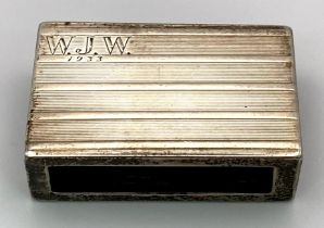 A 1932 Sterling Silver Matchbox Cover. 4.5cm x 2.5cm. 19.74g weight.