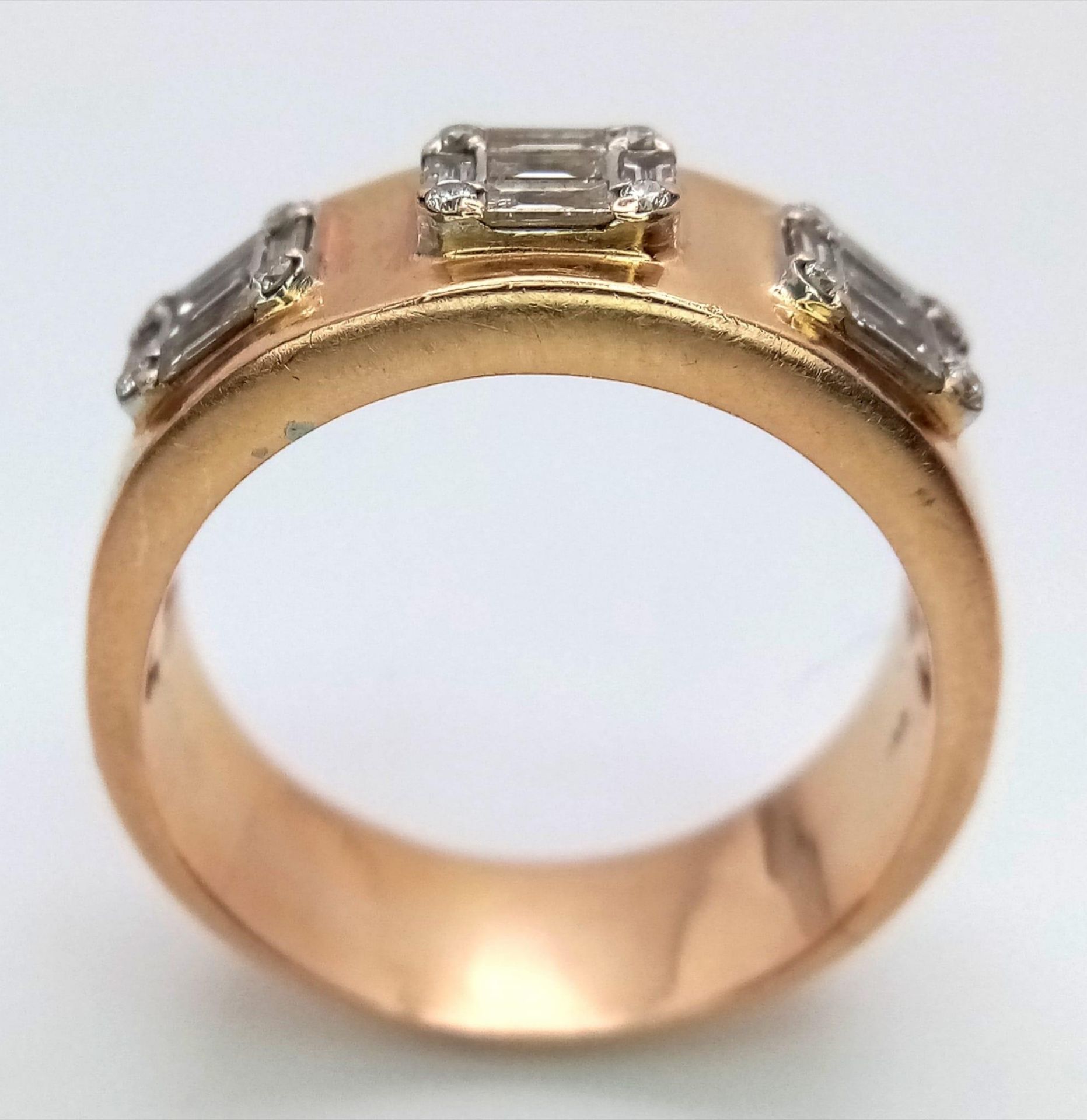 An 18K Rose Gold Diamond Gents Ring. Three sections of baguette and round cut diamonds symbolizing - Image 6 of 11