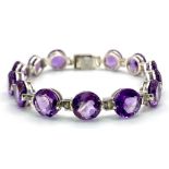 A Faceted Round Cut Amethyst Gemstone Tennis Bracelet. 19cm. 21.52g total weight.