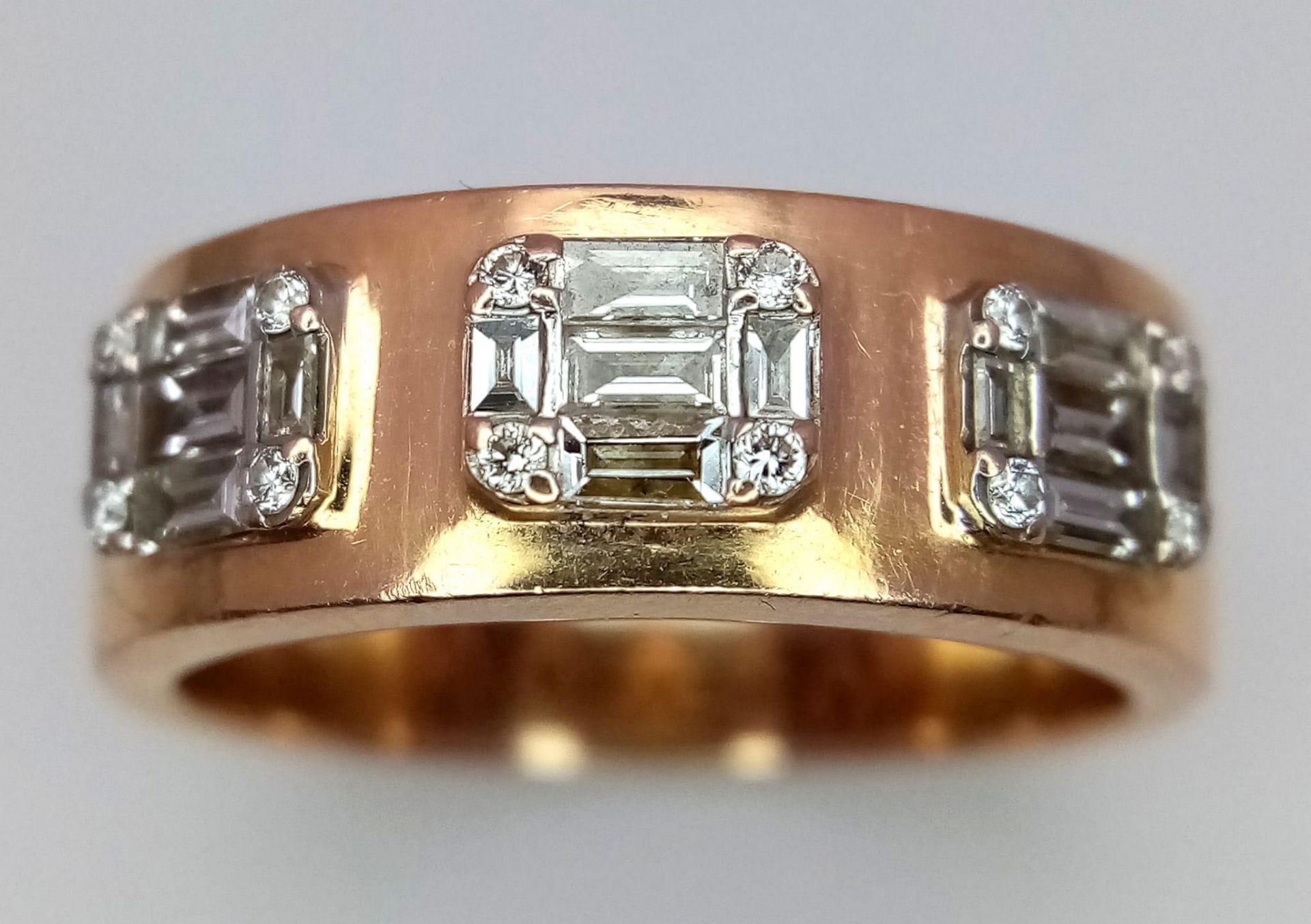 An 18K Rose Gold Diamond Gents Ring. Three sections of baguette and round cut diamonds symbolizing - Image 5 of 11