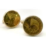 A Pair of 9K Yellow Gold Commemorative Cufflinks - 10 Years of Freedom. 12.9g total weight