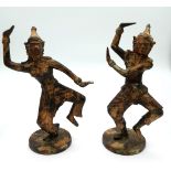 A Pair of 18th Century Bronze East Asian Dancing Figures. Both on circular bases. Lovely patina.