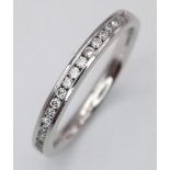 A PLATINUM DIAMOND BAND RING 0.25CT 3.7G SIZE O