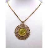 A 9 K yellow gold very artistic pendant with a full gold sovereign of Queen Victoria 1895, on a