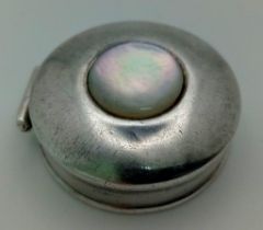 An elegant, SHEFFIELD Sterling Silver Pillbox. Fully hallmarked and set with a stunning Mother of