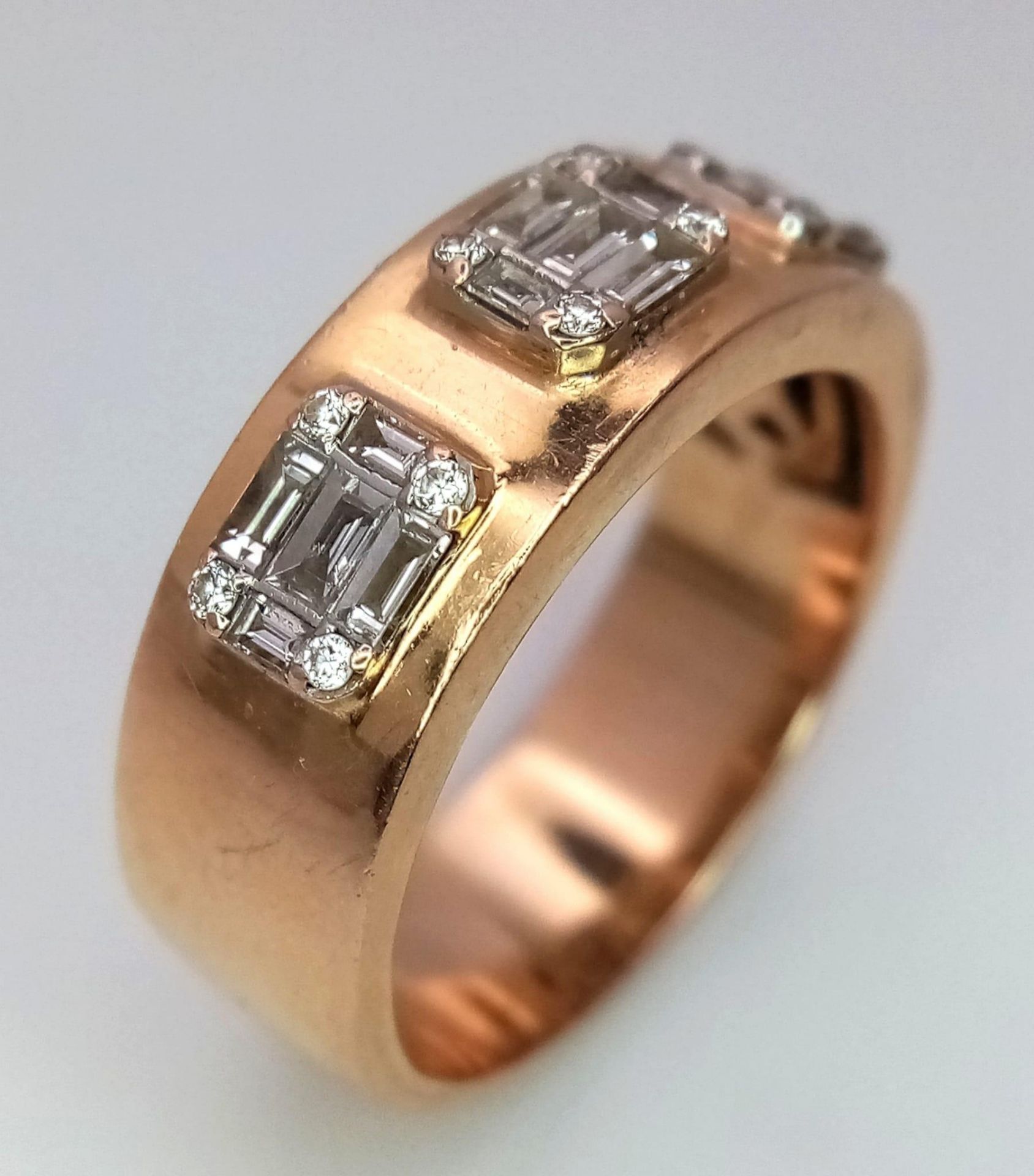 An 18K Rose Gold Diamond Gents Ring. Three sections of baguette and round cut diamonds symbolizing - Image 2 of 11