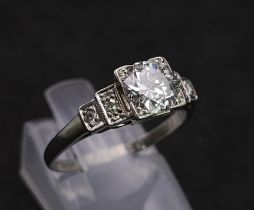 A Beautiful Vintage 18K White Gold and Platinum Diamond Ring. Central, quality 0.75ct brilliant