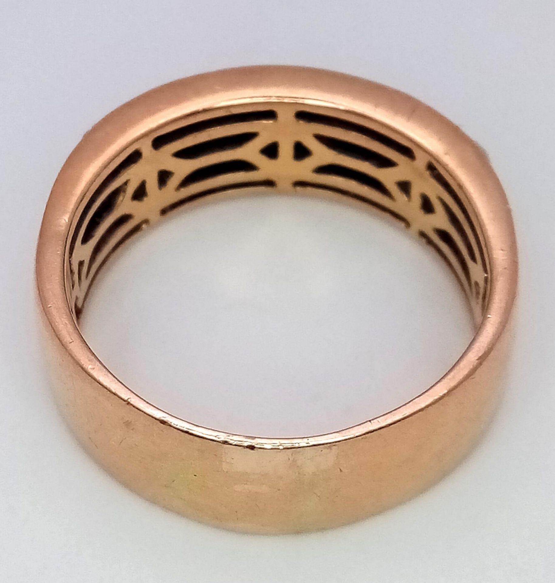 An 18K Rose Gold Diamond Gents Ring. Three sections of baguette and round cut diamonds symbolizing - Image 8 of 11