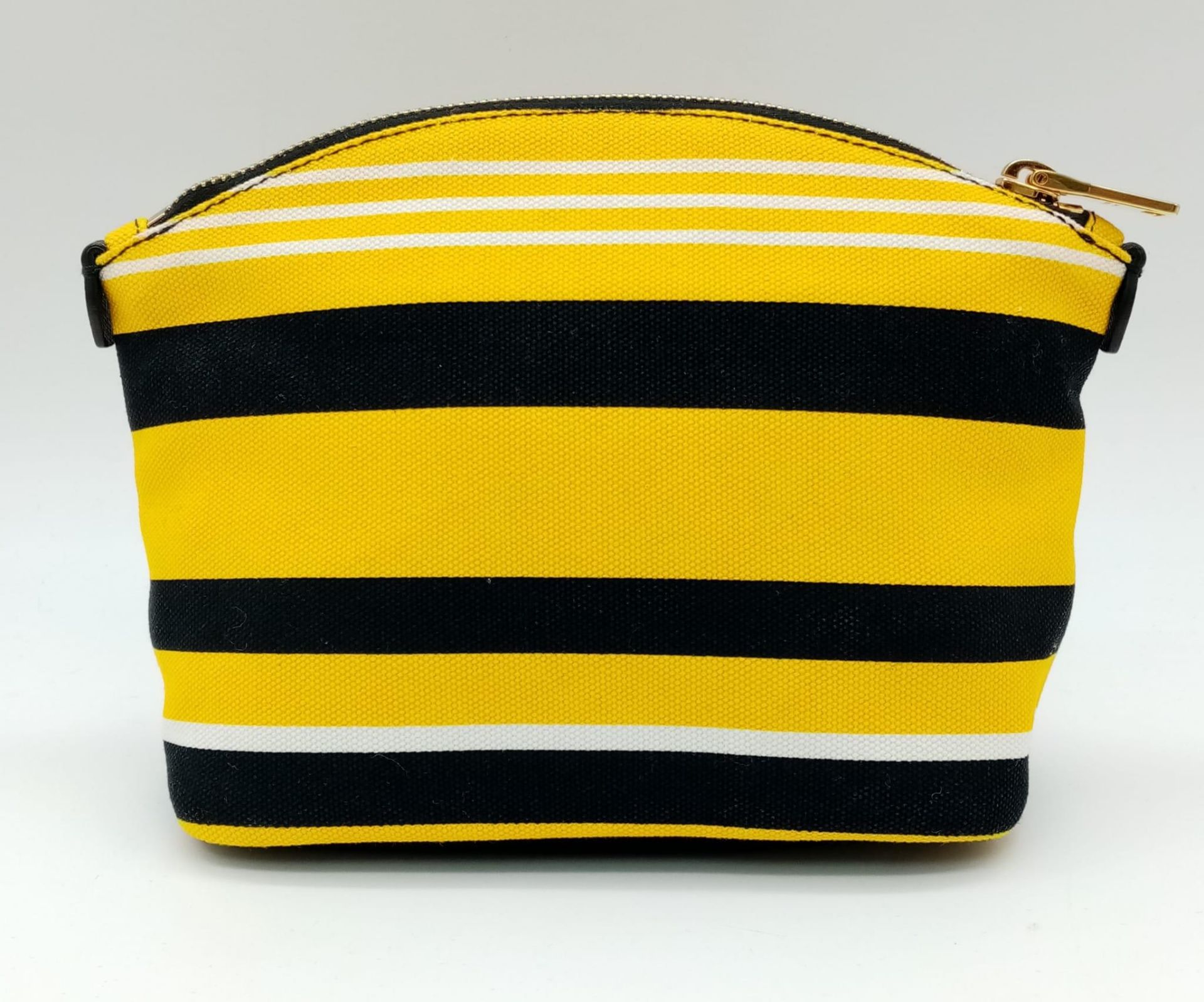 A Prada Yellow, Black and White Pouch. Textile exterior, with gold tone hardware and top zip, and - Image 3 of 13