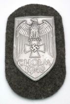 WW2 German Heer (Army) Cholm Campaign Shield in presentation case. Silvered Steel (Magnetic).