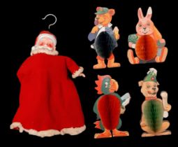 A collection of 5 vintage 1950's Christmas decorations. A jolly light up tree hanging Santa and four