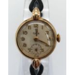 A Vintage (1950s) 9K Gold Tudor Ladies Watch. Black leather strap. 9K gold case - 22mm. White dial