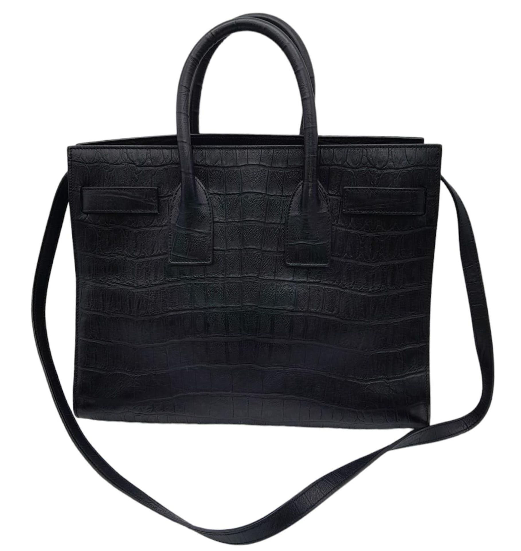 A Saint Laurent Sac de Jour Handbag. Crocodile embossed leather exterior with silver hardware and - Image 4 of 21