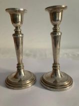 Pair of Beautiful Tapered SILVER CANDLESTICKS having attractive gadroun detail. Condition new and