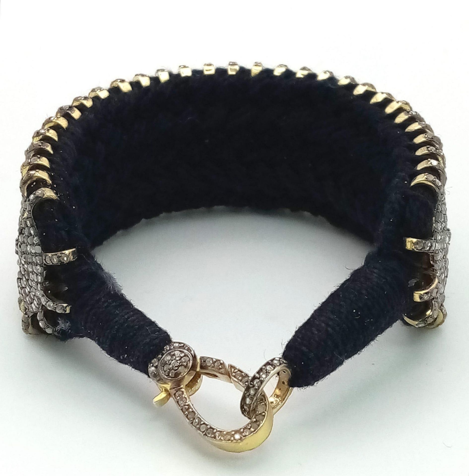 A Brilliantly Unique Handcrafted Designer Diamond Bracelet. A black woven textile bracelet strap - Image 6 of 7