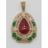 A Delightful Ruby, Opal, Emerald and Diamond Pendant set in Gilded 925 Silver. Ruby weight 20.8ct.