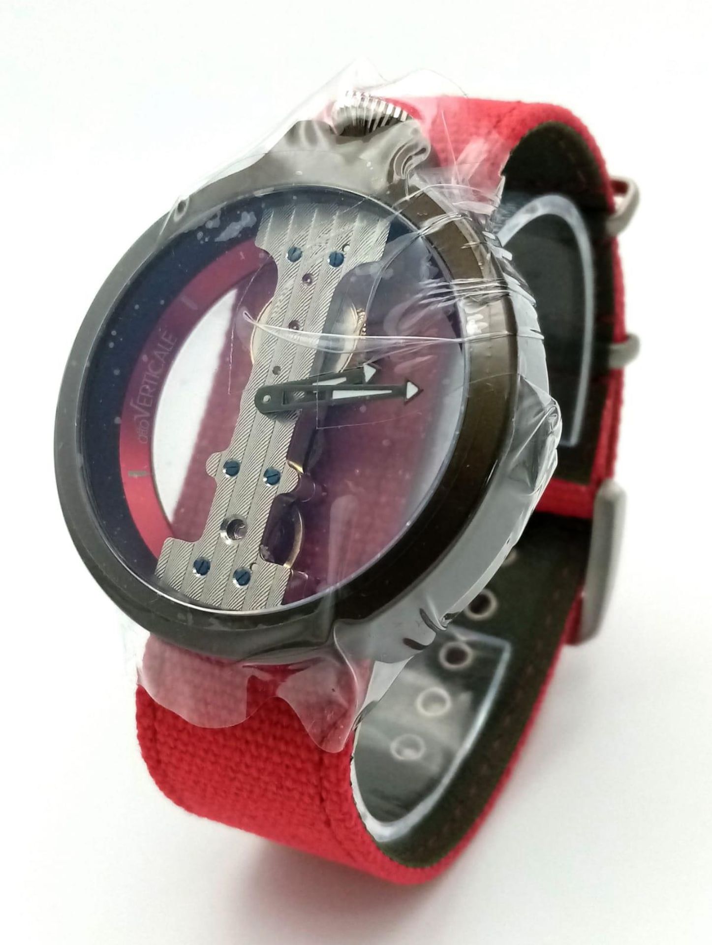 A Gents Verticale Mechanical Skeleton Watch. Red textile strap. Case - 42mm. Top winder. In