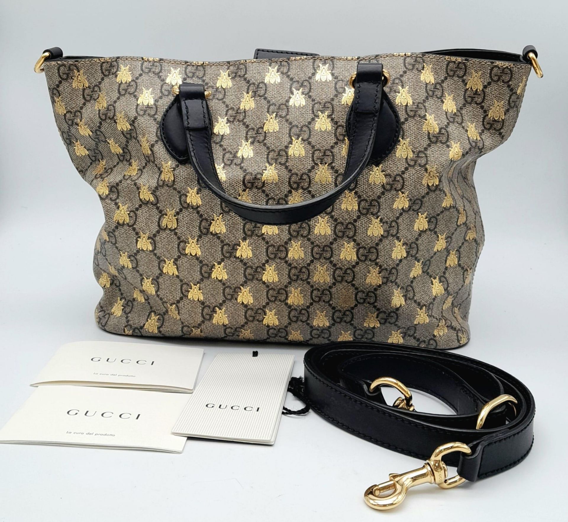 GUCCI GG Supreme Bee Satchel, This satchel features a coated canvas body, flat leather handles, a - Image 8 of 8