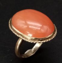 An Antique 9K Yellow Gold and Carnelian Ring. A rich cognac coloured carnelian cabochon. Size K. 6.