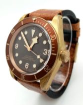 A Tudor Black Bay 58 Automatic Gents Watch. Brown leather strap. Gold plated case - 43mm. Rich
