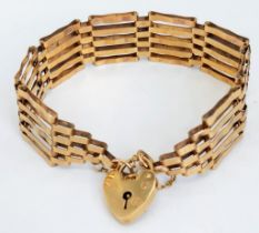 A Vintage 9K Yellow Gold Gate Bracelet with Heart Clasp. 16cm. 11.11g weight.
