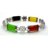A Multi Coloured Jade Thin Bar Bracelet. Bar length - 16mm. Bracelet length - 18cm. Set in white