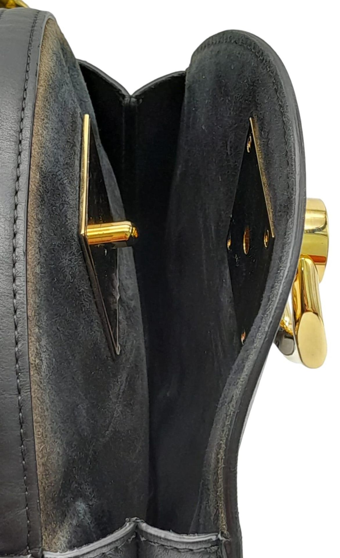 A Balmain Black 'Twist' Crossbody Bag. Leather exterior, with gold-tone hardware and zipper and - Image 4 of 10