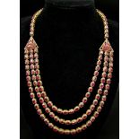 An Asian-Inspired Three Row Ruby and Diamond Necklace -with 33ctw of Rubies and with 3ctw Approx