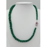 A 230ctw Emerald Gemstone Necklace with Ruby and 925 Silver Clasp. Graduating faceted emerald beads.