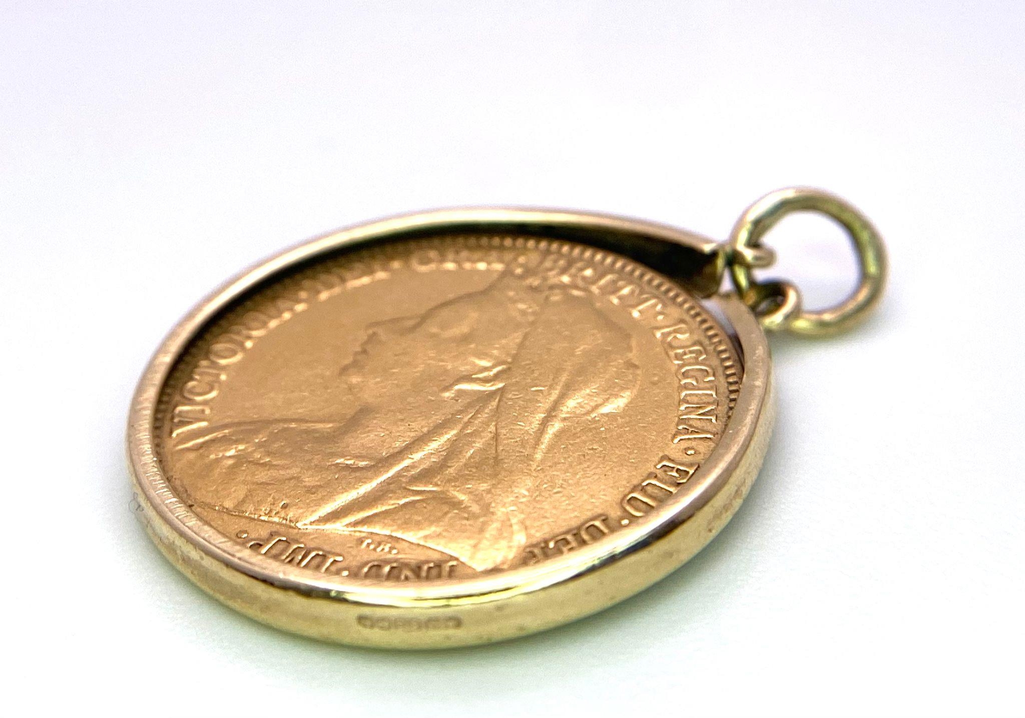 A 22k yellow gold half sovereign coin dated 1894, set in 9ct yellow gold bezel pendant mount (