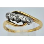 An Antique 18k Gold and Platinum Diamond Crossover Ring. Size M. 2.68g total weight.