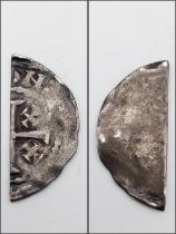 An 1151-89 Henry II Tealby Cut 1/2d Coin.