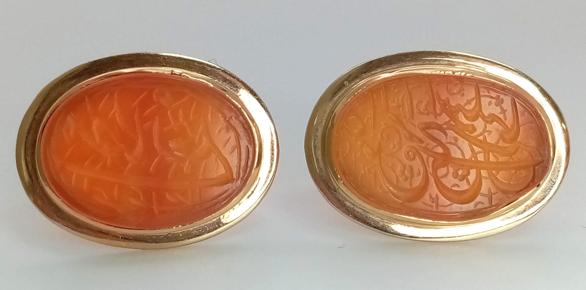 A Pair of Vintage 14K Gold Hand-Carved Orange Hardstone Cufflinks. 13.2g total weight. - Image 3 of 5