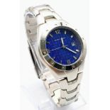 An Unworn Men’s Blue Face Stainless Steel Sports by Petroleum. Comes in its Vintage Style Metal