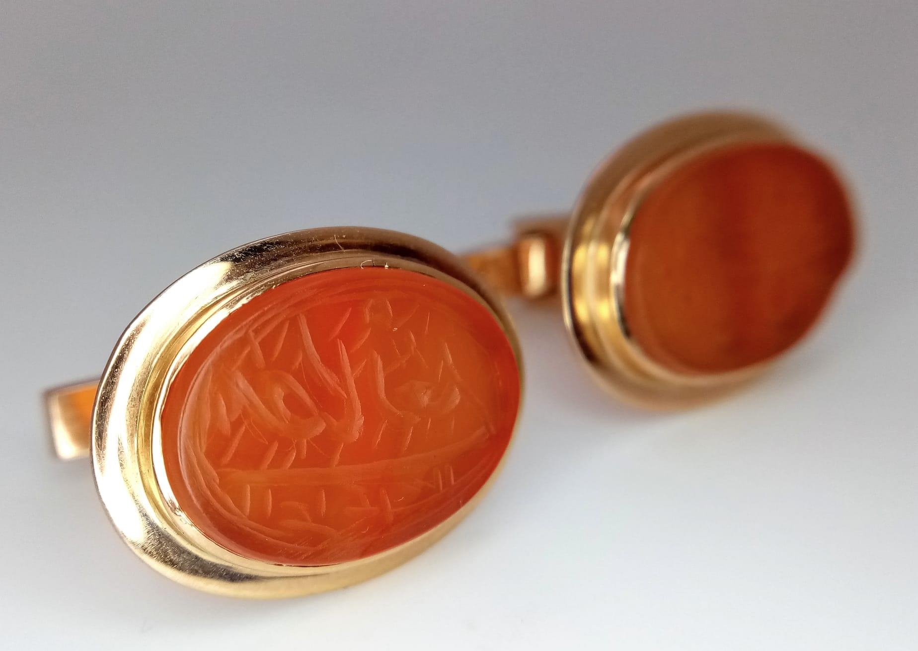 A Pair of Vintage 14K Gold Hand-Carved Orange Hardstone Cufflinks. 13.2g total weight. - Image 2 of 5