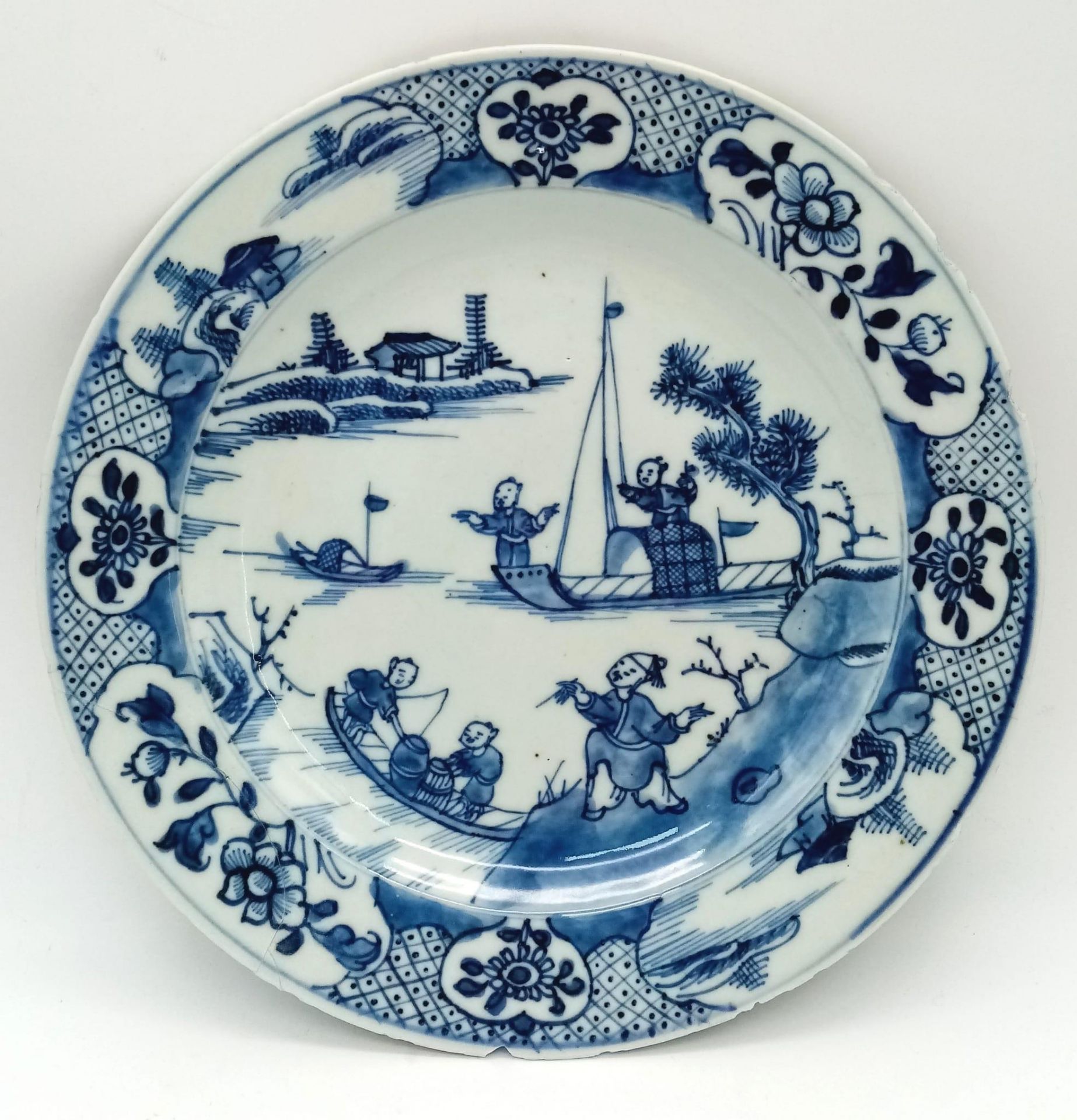 An 18th Century Chinese Blue and White Ceramic Plate. Has been repaired so a/f.