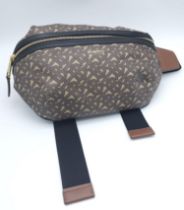 Burberry Canvas Bum Bag. 'B' monogrammed pattern with gold tone hardware. Main zip reveals sizable