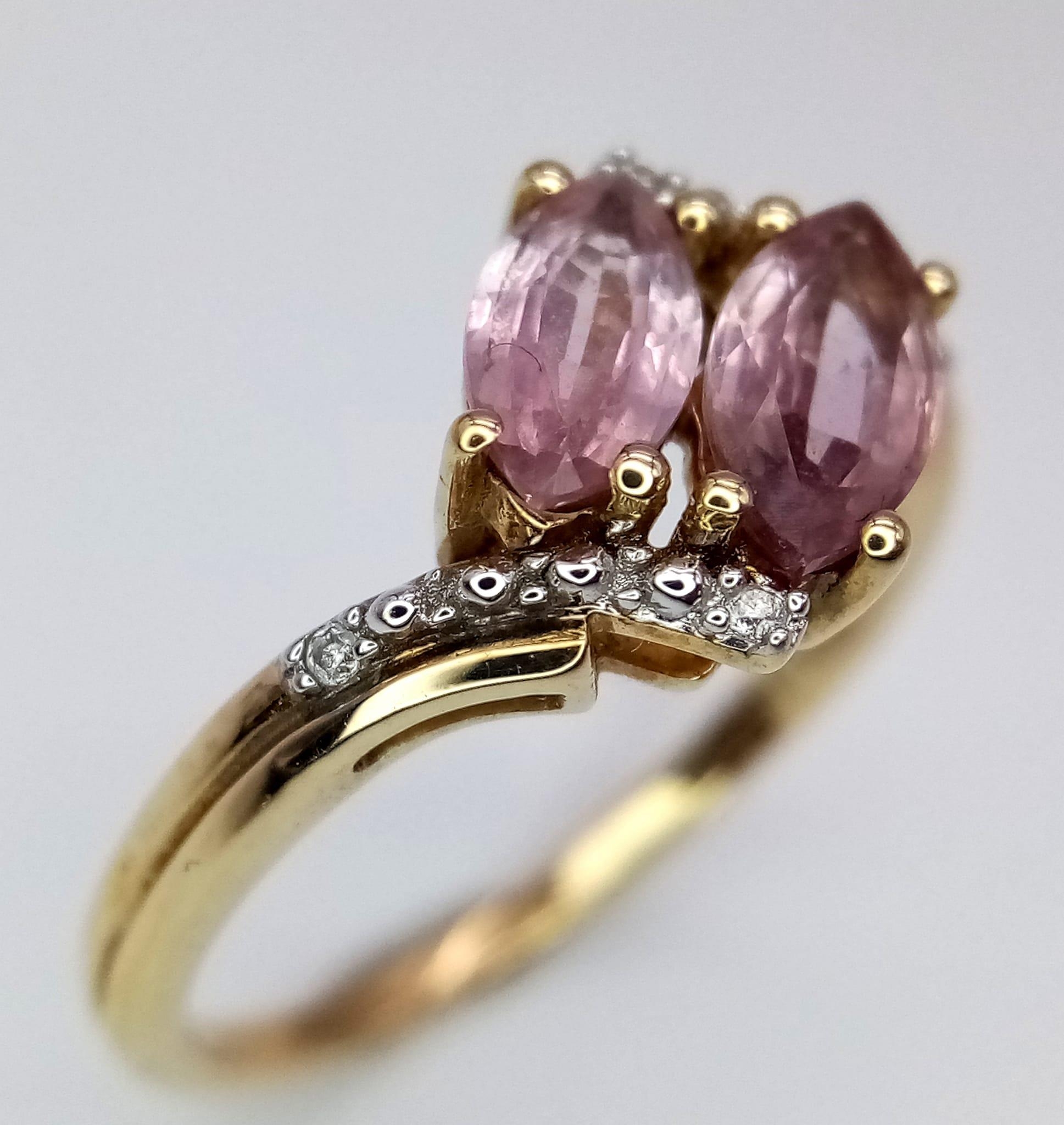 A 10k Yellow Gold, Amethyst and Diamond Crossover Ring. Size N. 2.17g total weight. - Image 2 of 4