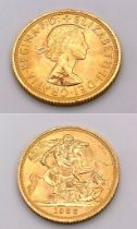 A 1962 Queen Elizabeth II 22K Gold Sovereign. EF.
