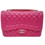 Chanel Mademoiselle Chic Flap Bag. Beautiful deep pink quilted lambskin leather with diamond